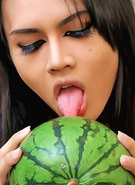 Ladyboy fucks a melon like a freak